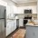 a kitchen with white cabinets
