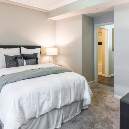 spacious, carpeted bedroom