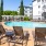 a pool with chairs around it