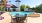 table and chairs near pool